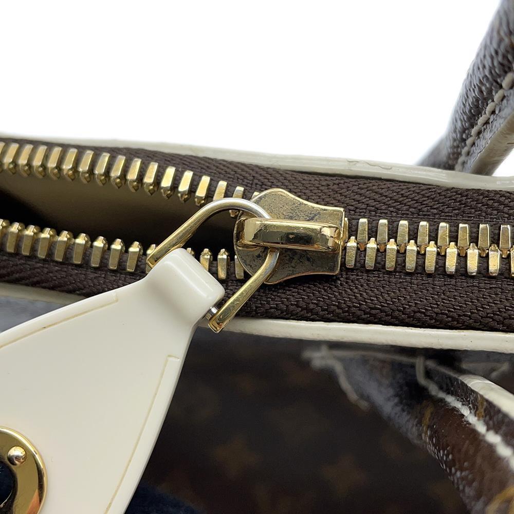 LOUIS VUITTON Lock It BrownM40597 Monogram Shiny