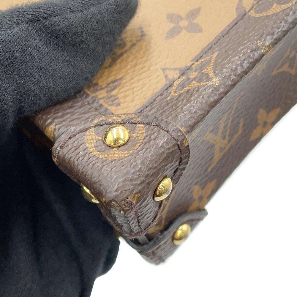LOUIS VUITTON Pochette Trunk Vertical BrownM67873 Monogram Reverse Canvas