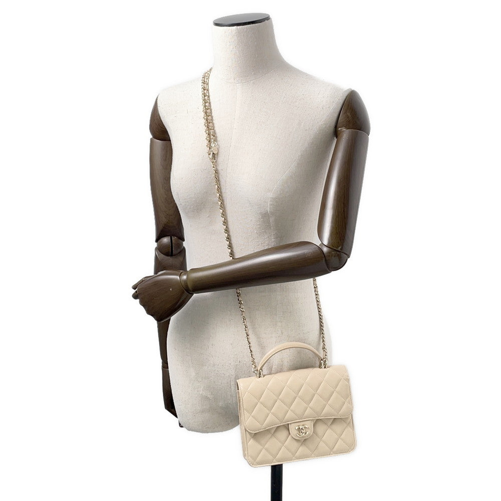 CHANEL Matelasse Top Handle Mini Chain Backpack Beige Lambskin