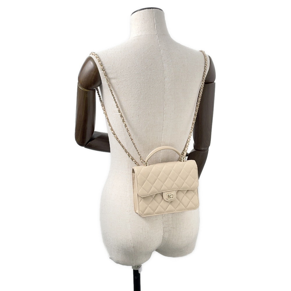 CHANEL Matelasse Top Handle Mini Chain Backpack Beige Lambskin