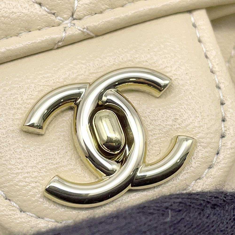 CHANEL Matelasse Top Handle Mini Chain Backpack Beige Lambskin