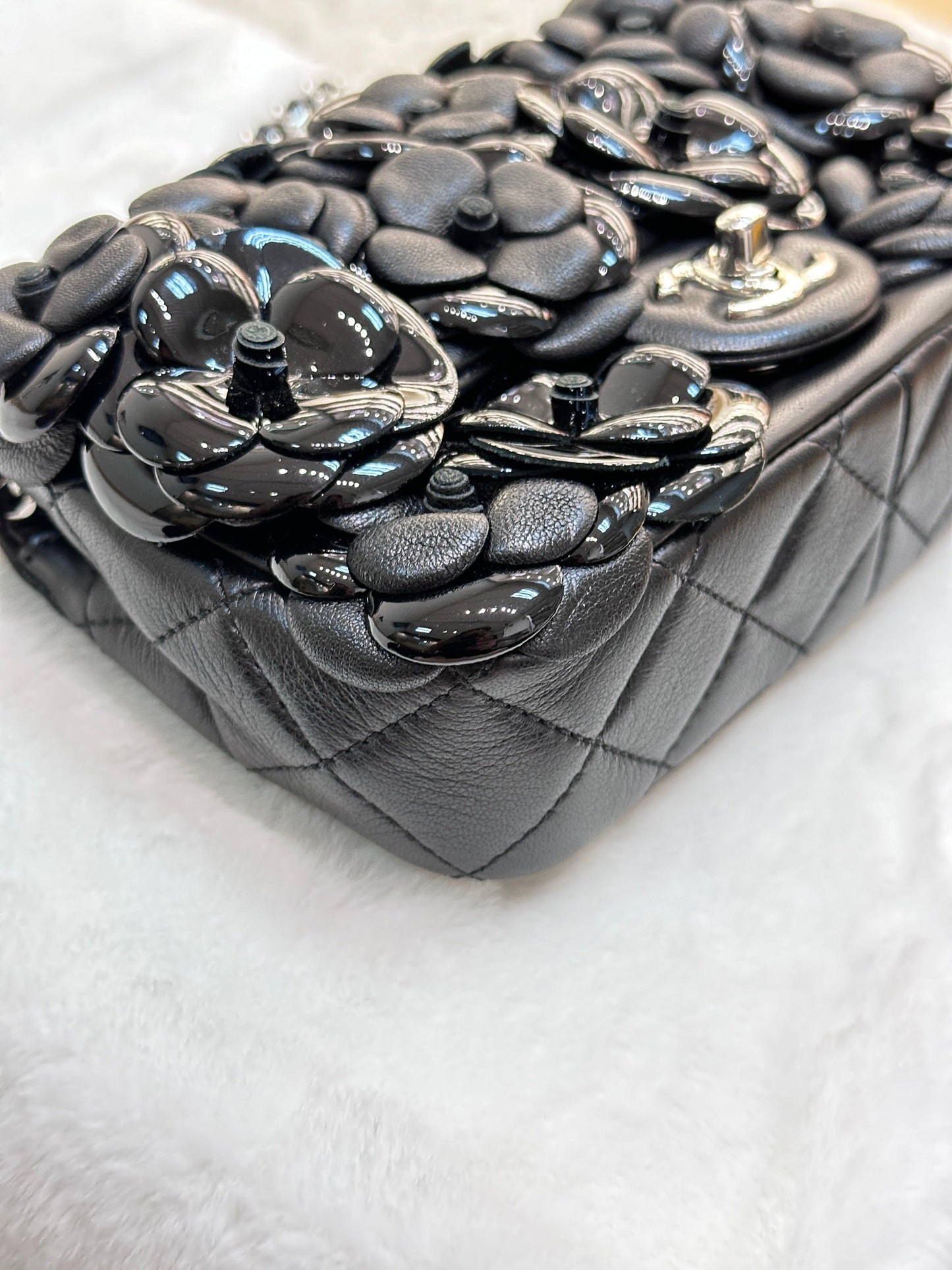 Chanel Limited Edition Black Camellia Mini Flap Bag.