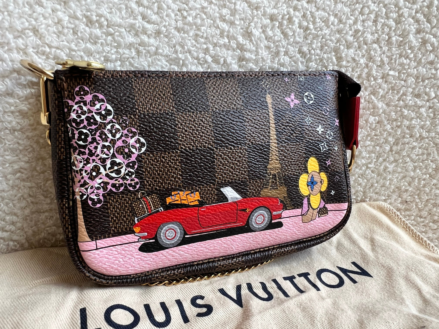 Louis Vuitton Christmas Edition Vivienne Animated Mini Pochette Accessoires in Monogram (RRP £630)