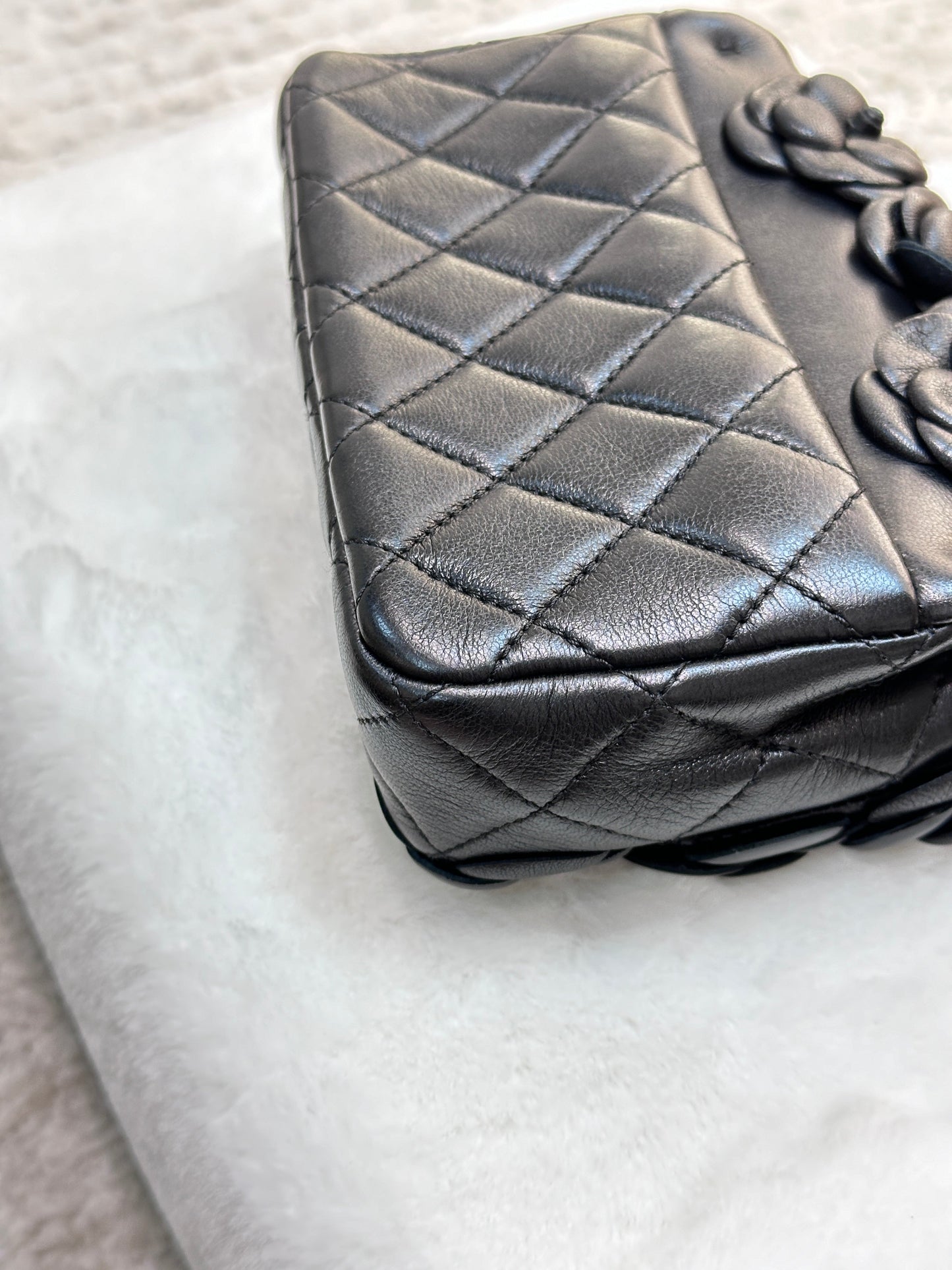 Chanel Limited Edition Black Camellia Mini Flap Bag.
