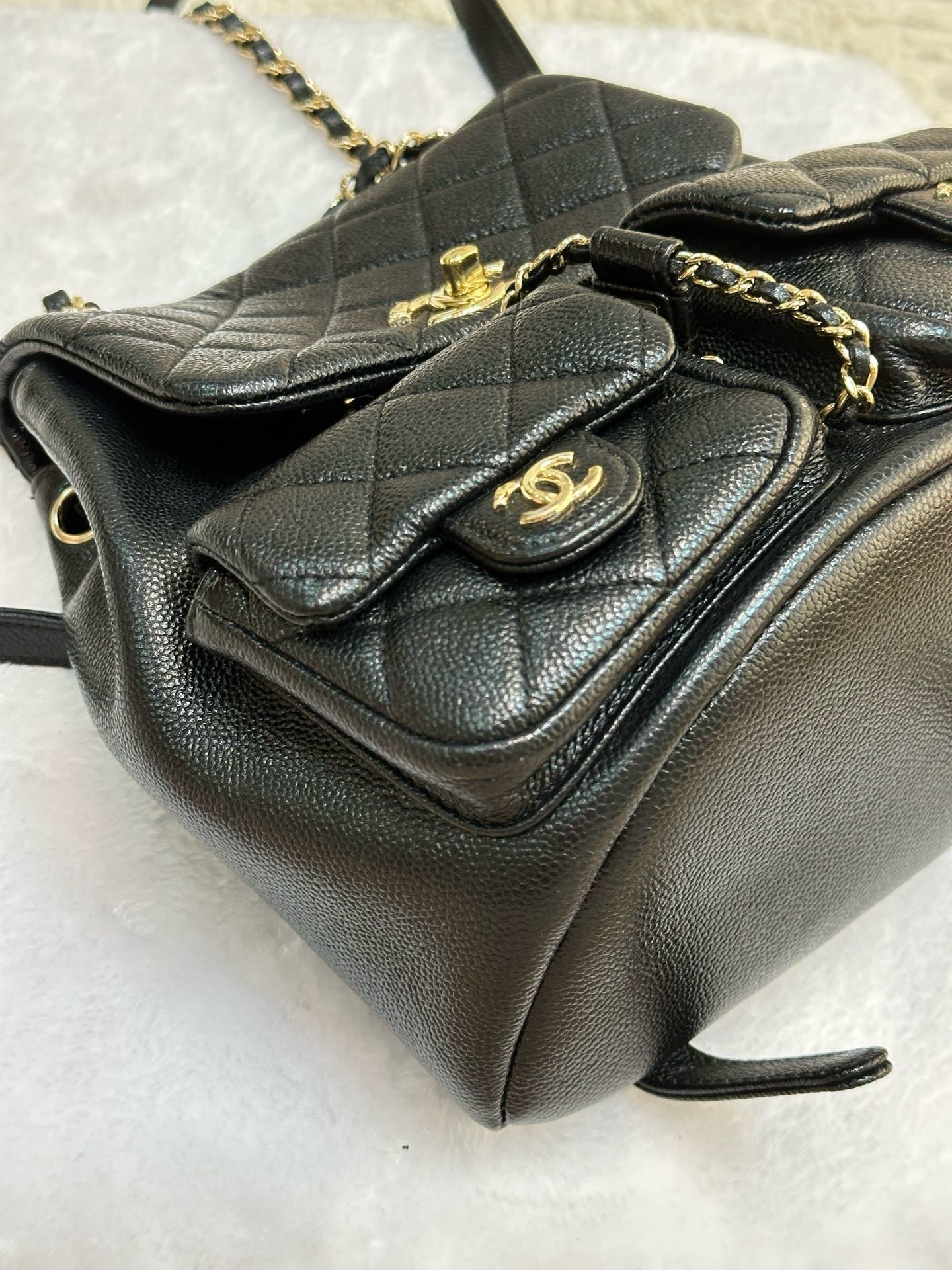 Chanel 23P Small Shiny Caviar Quilted Duma Pockets Drawstring Backpack Black GHW