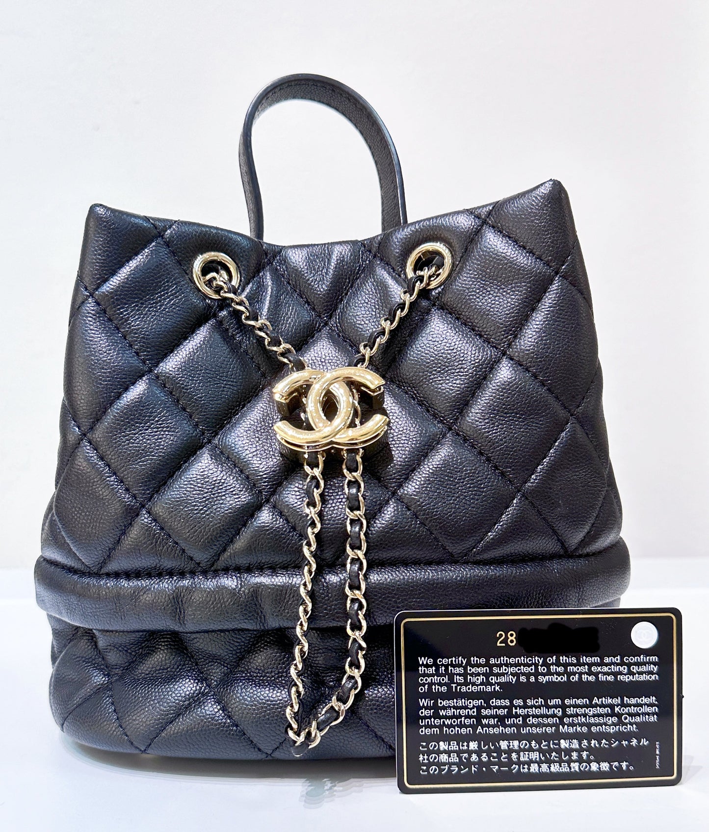 CHANEL Caviar Quilted Rolled Up Bucket Drawstring Bag Black