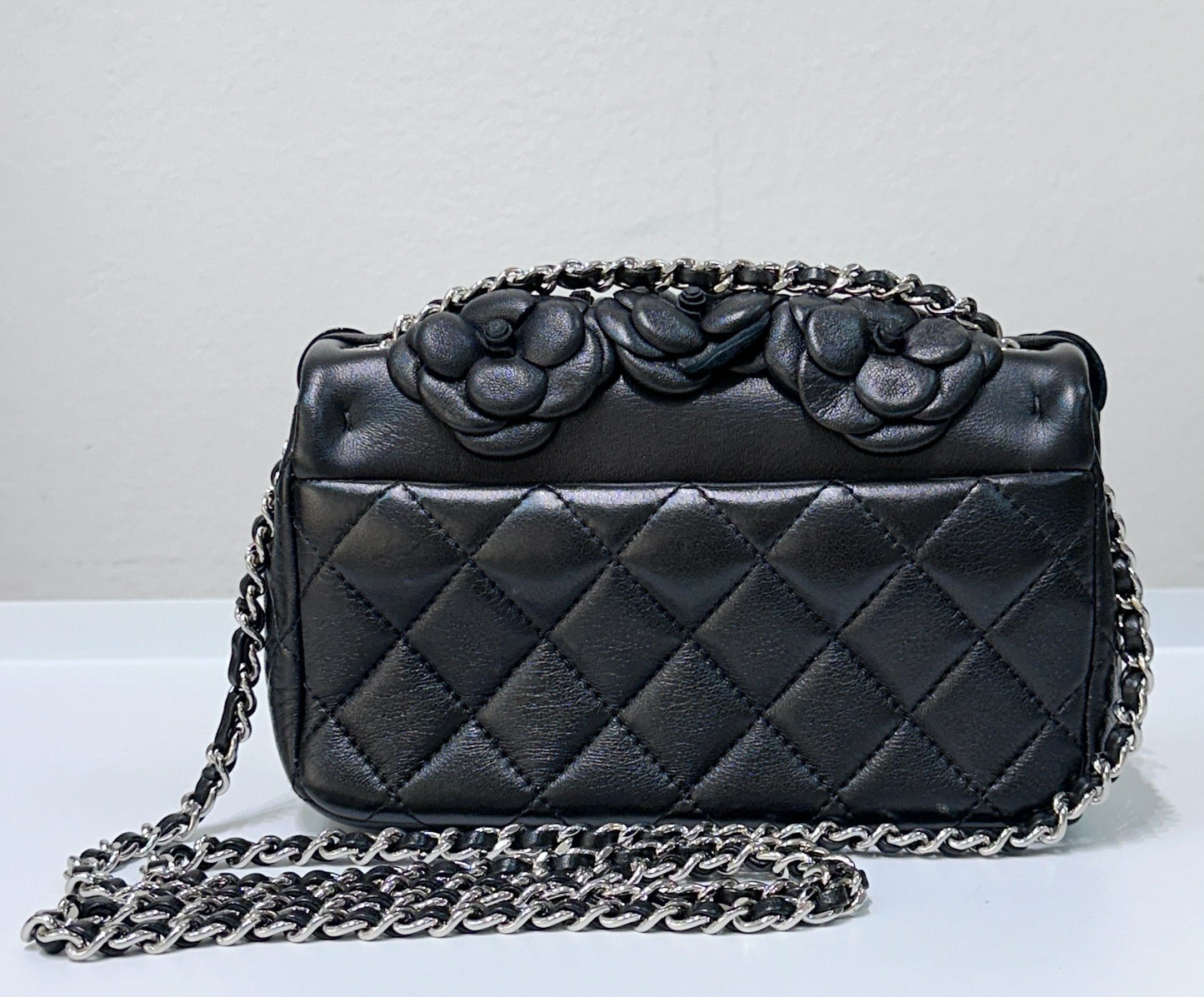 Chanel Limited Edition Black Camellia Mini Flap Bag.