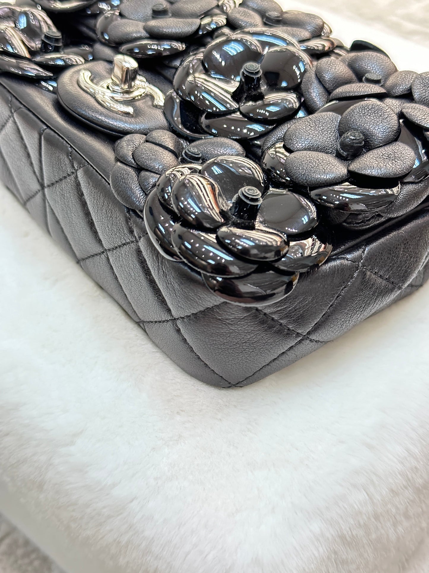 Chanel Limited Edition Black Camellia Mini Flap Bag.