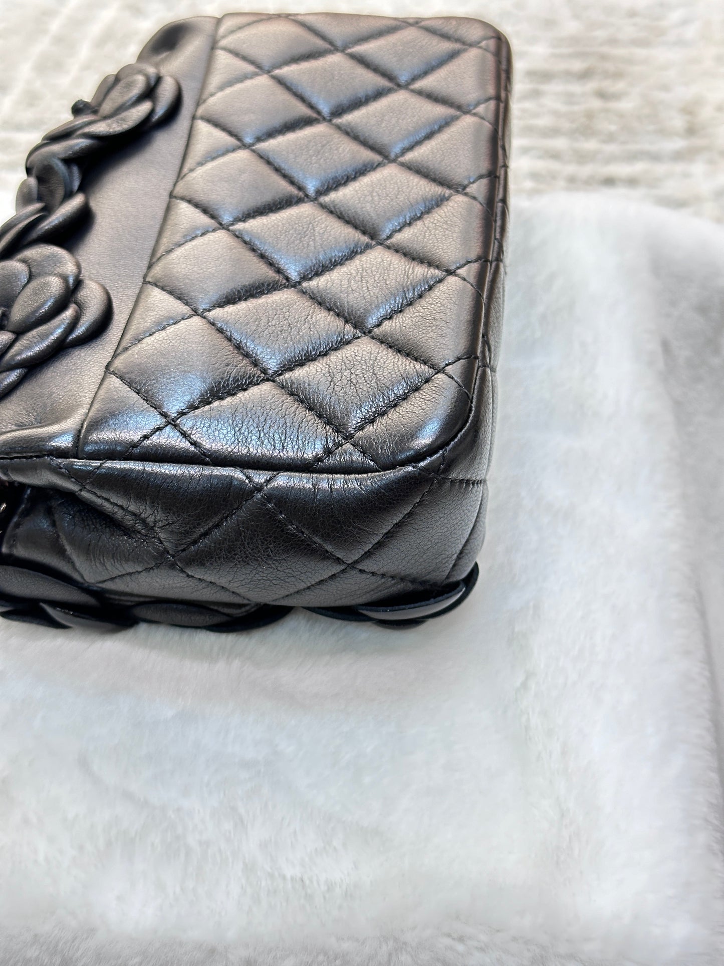 Chanel Limited Edition Black Camellia Mini Flap Bag.
