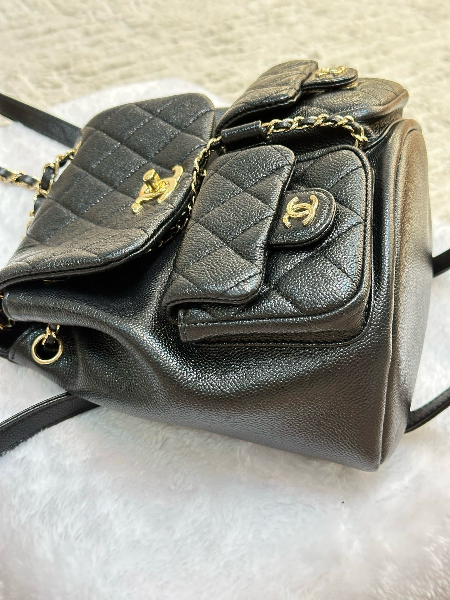 Chanel 23P Small Shiny Caviar Quilted Duma Pockets Drawstring Backpack Black GHW
