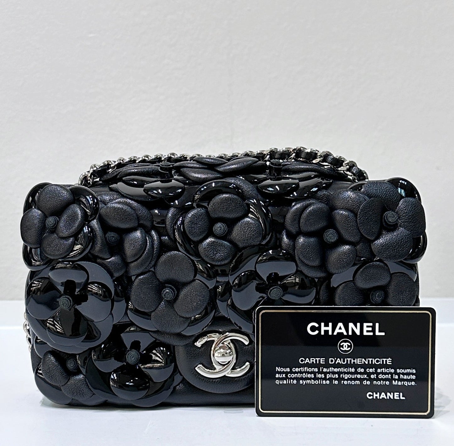 Chanel Limited Edition Black Camellia Mini Flap Bag.