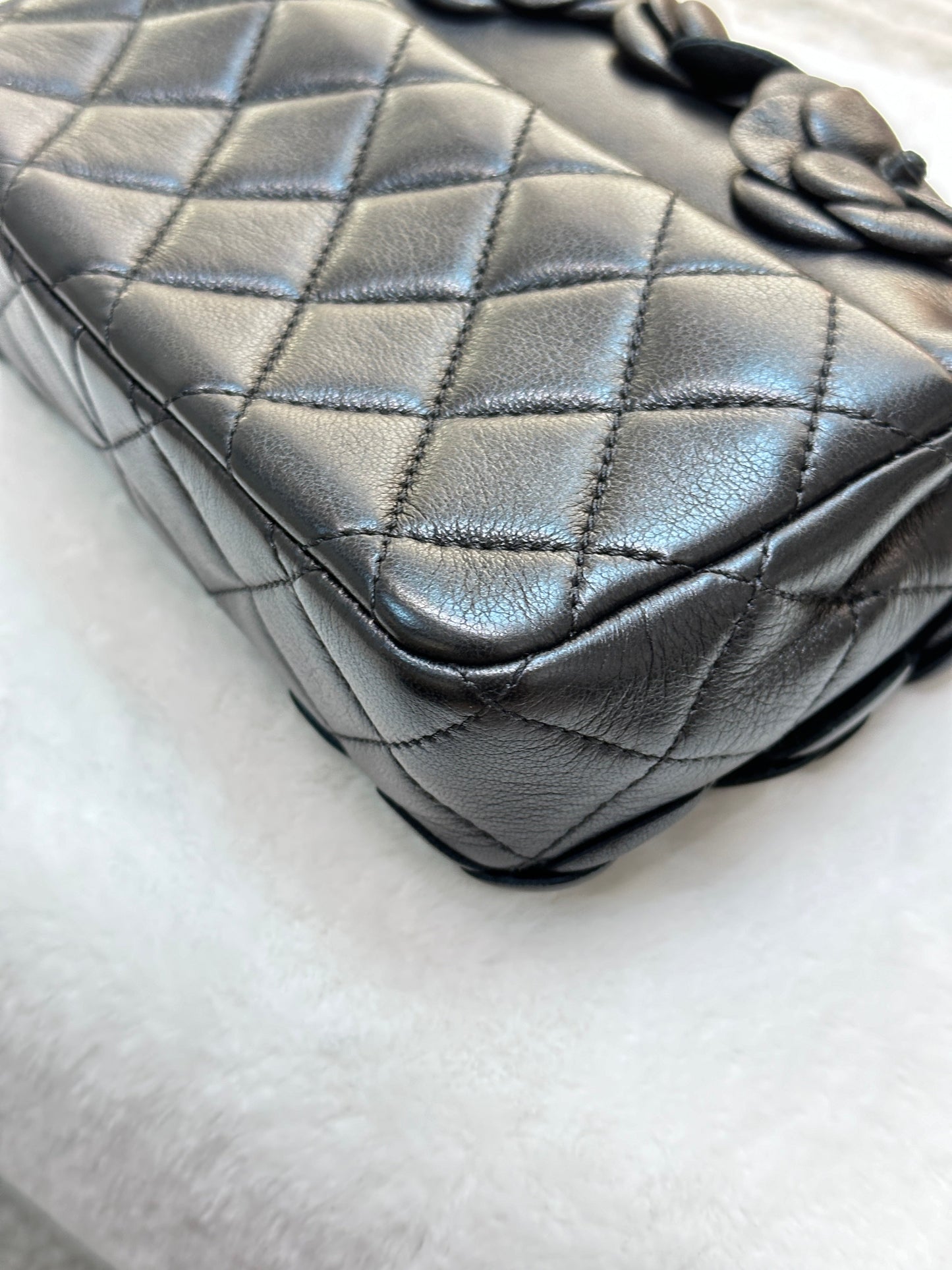 Chanel Limited Edition Black Camellia Mini Flap Bag.