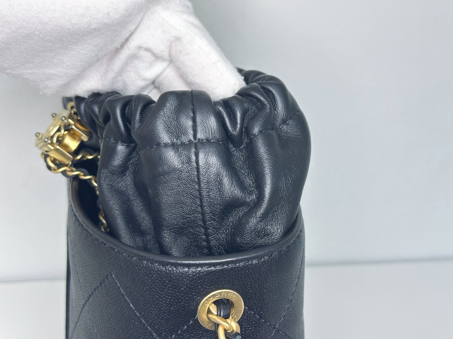 Chanel Drawstring Bucket Bag Quilted Black Caviar Aged Gold Hardware 3088 holo card