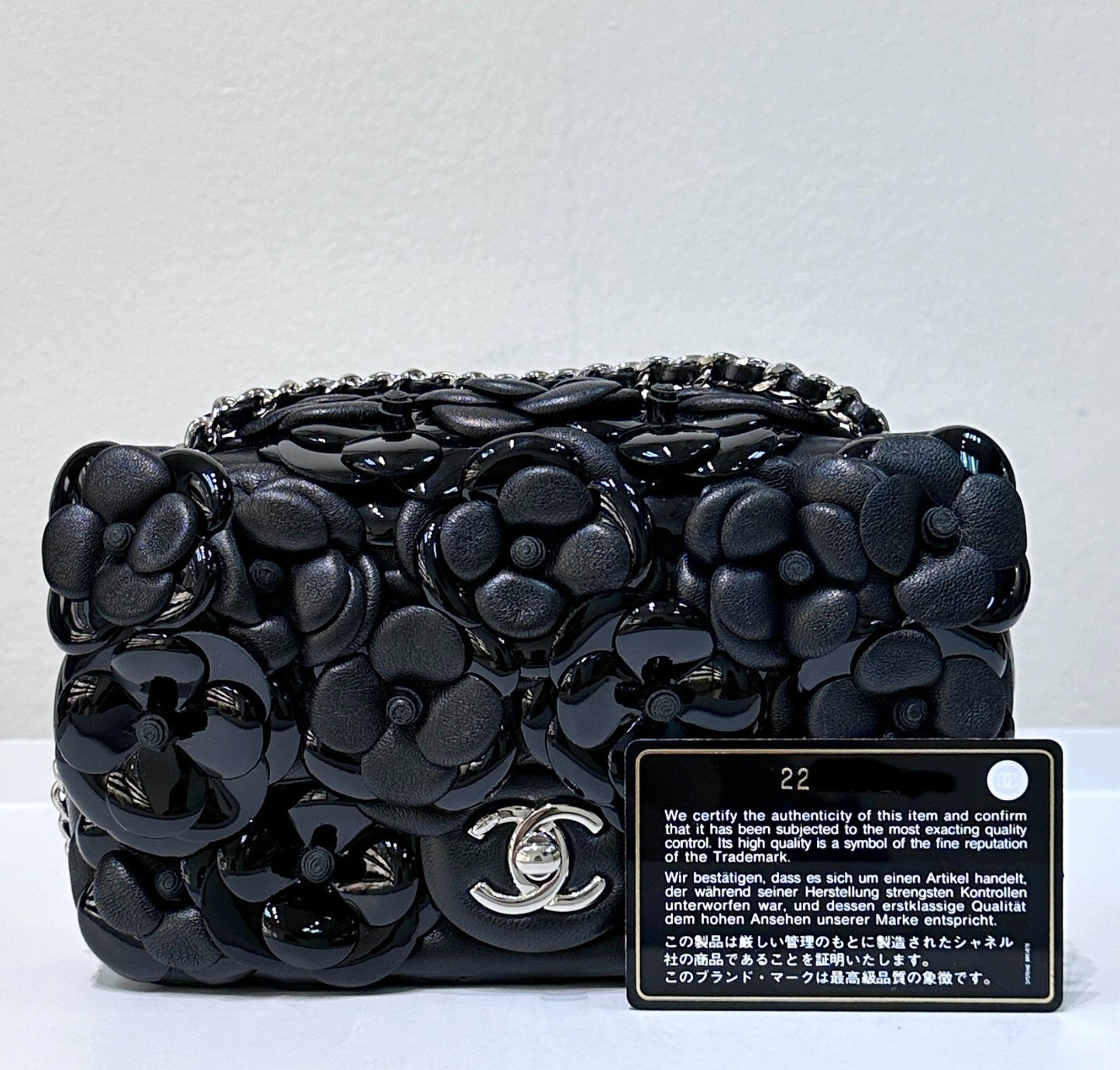 Chanel Limited Edition Black Camellia Mini Flap Bag.