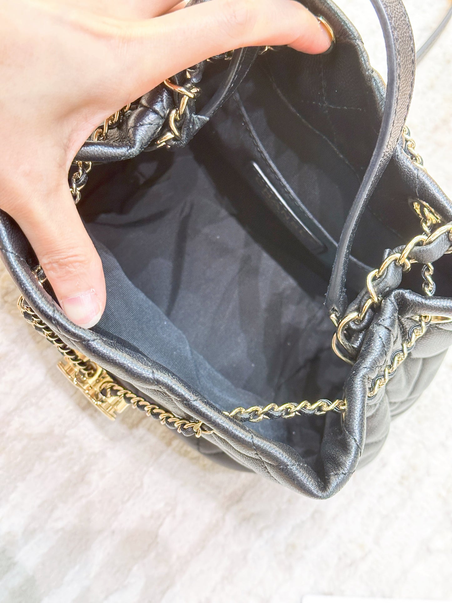CHANEL Caviar Quilted Rolled Up Bucket Drawstring Bag Black