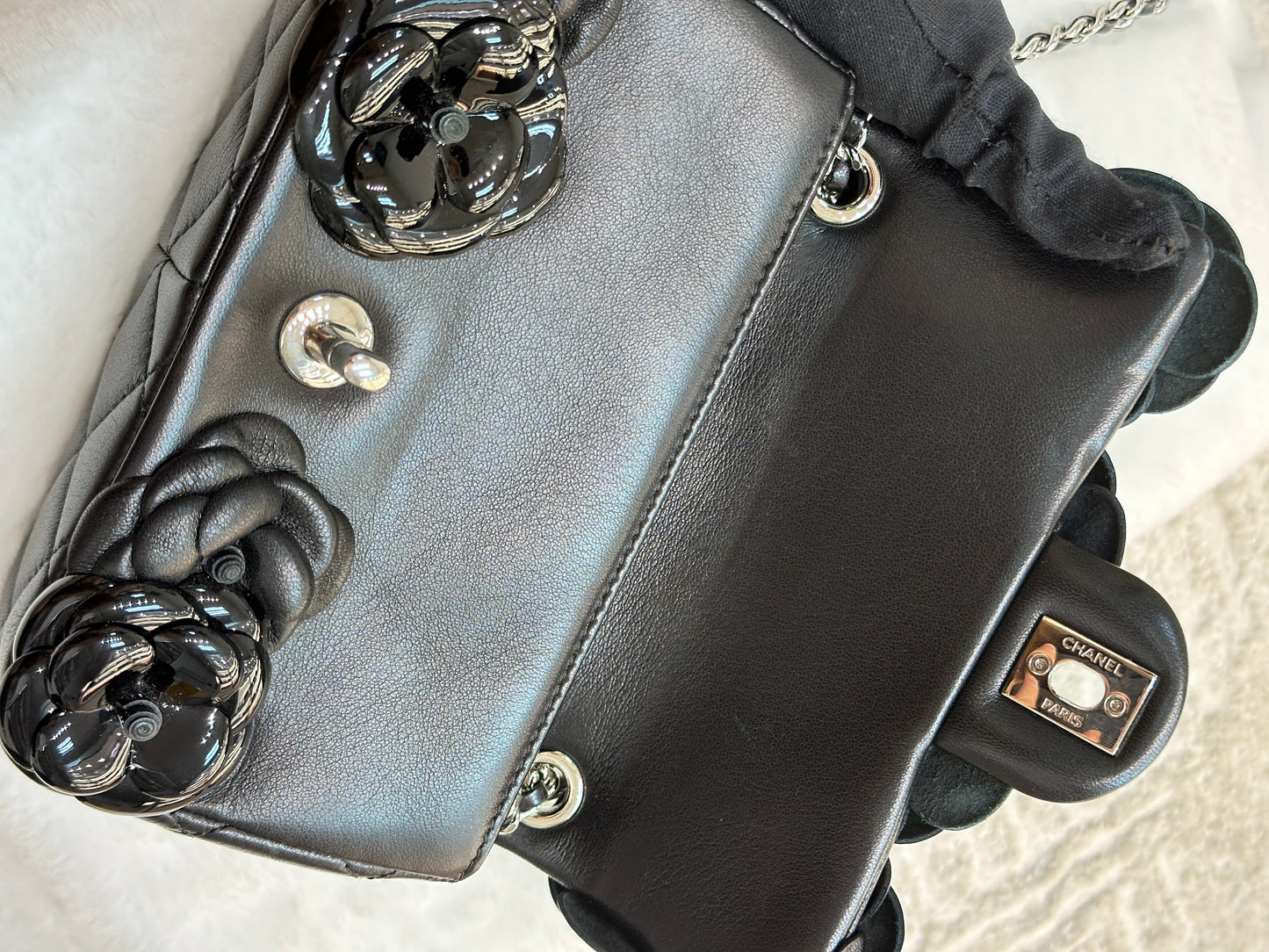 Chanel Limited Edition Black Camellia Mini Flap Bag.
