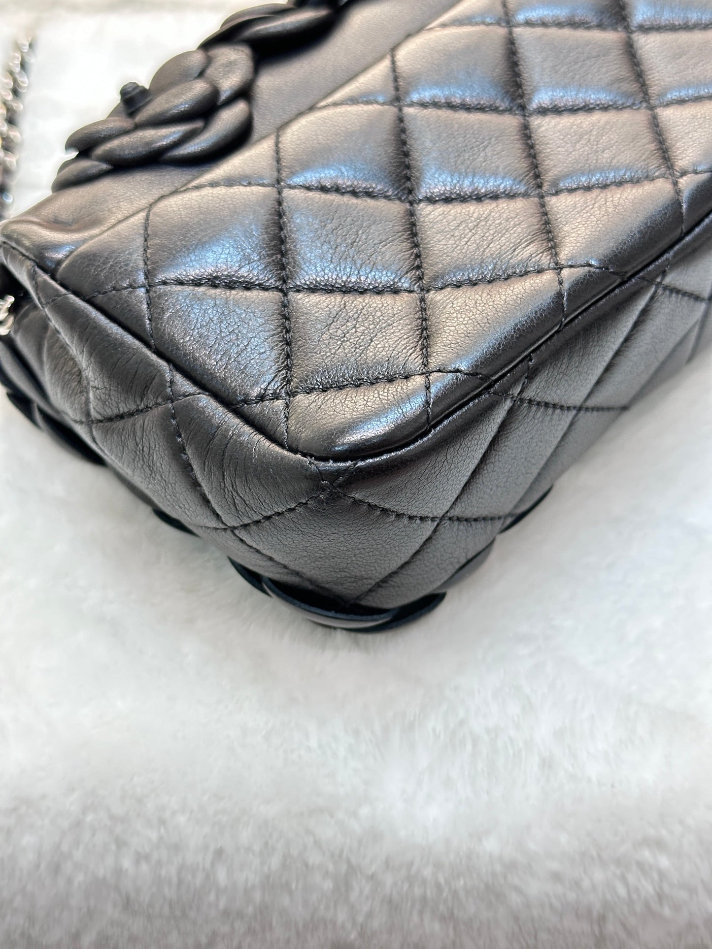 Chanel Limited Edition Black Camellia Mini Flap Bag.