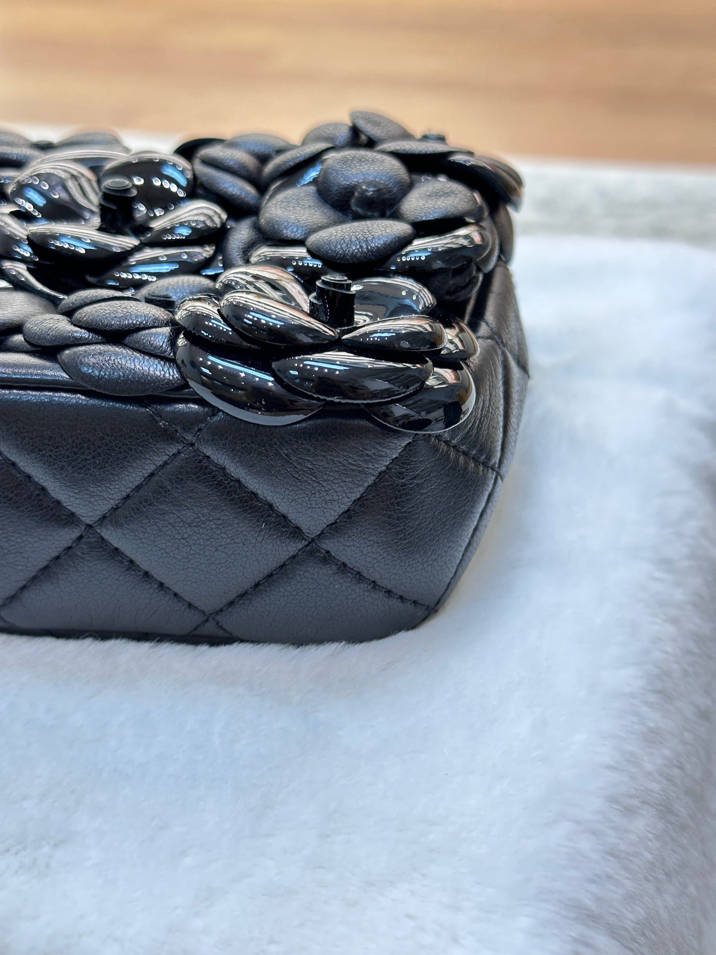 Chanel Limited Edition Black Camellia Mini Flap Bag.
