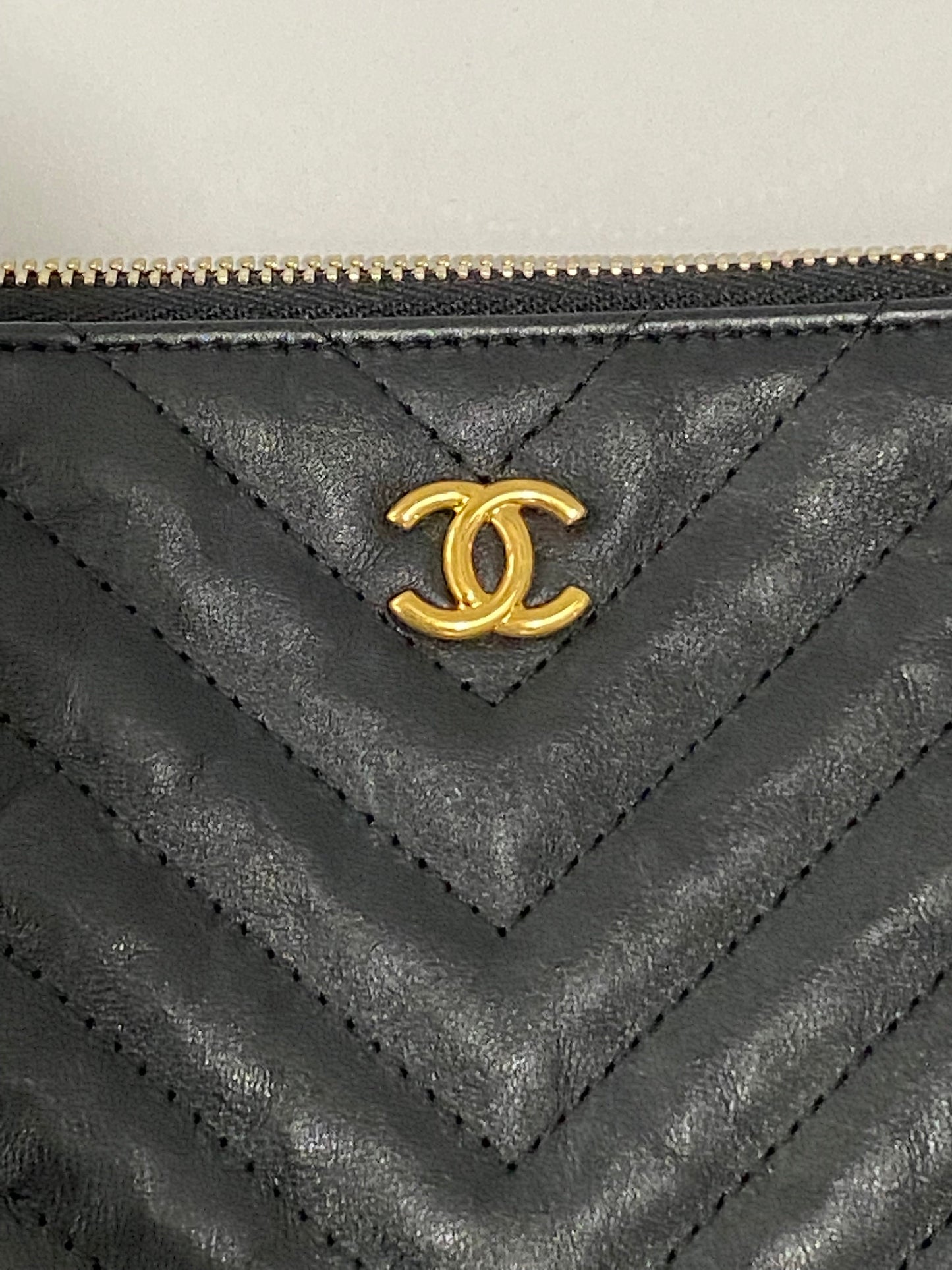 CHANEL CHEVRON QUILTED CALFSKIN O CLUTCH BAG