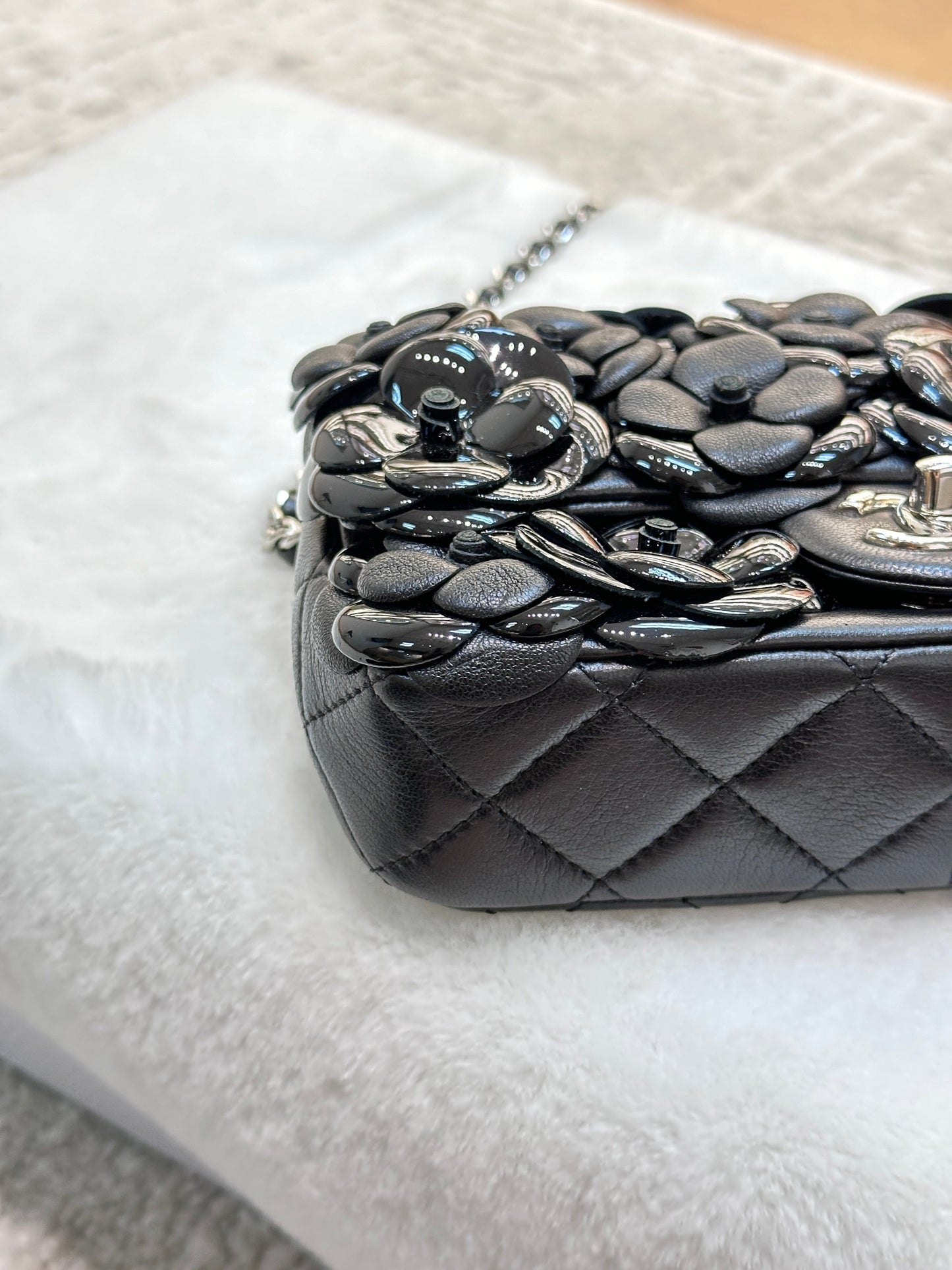 Chanel Limited Edition Black Camellia Mini Flap Bag.