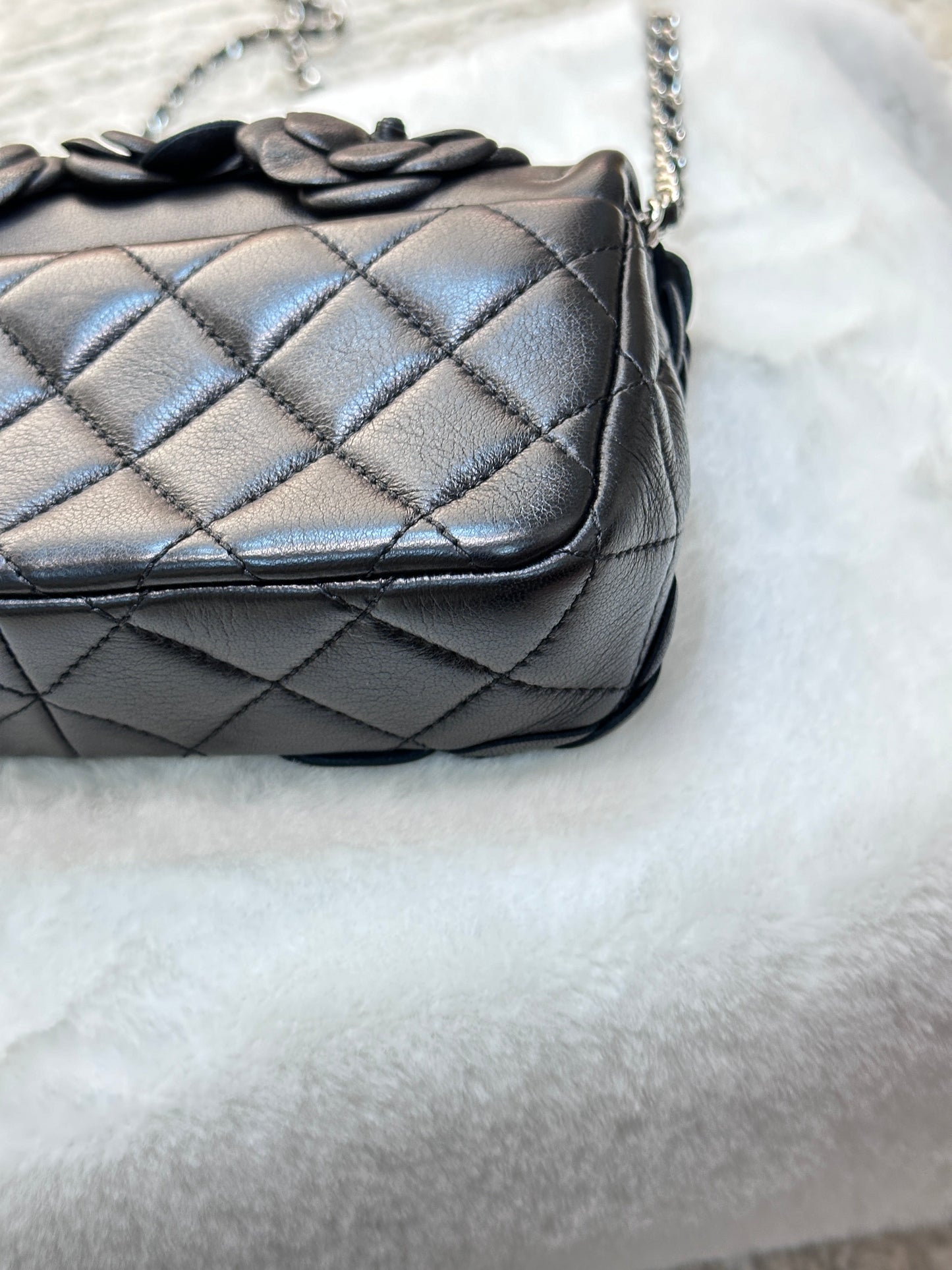 Chanel Limited Edition Black Camellia Mini Flap Bag.