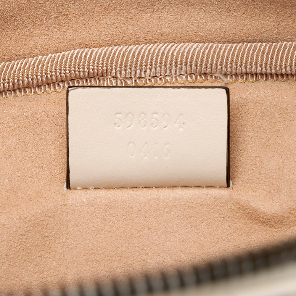 Gucci Matelasse Leather GG Marmont Round Mini Backpack