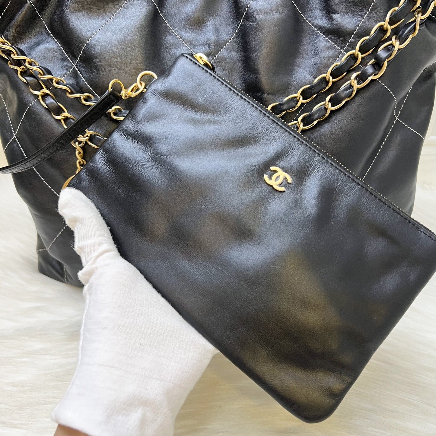 Chanel 22 Medium Hobo Handbag in Black Calfskin with White Stitch Quilting and AGHW (Model: AS3261)