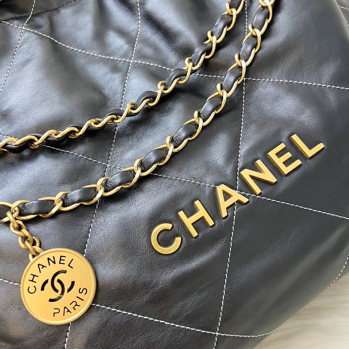 Chanel 22 Medium Hobo Handbag in Black Calfskin with White Stitch Quilting and AGHW (Model: AS3261)