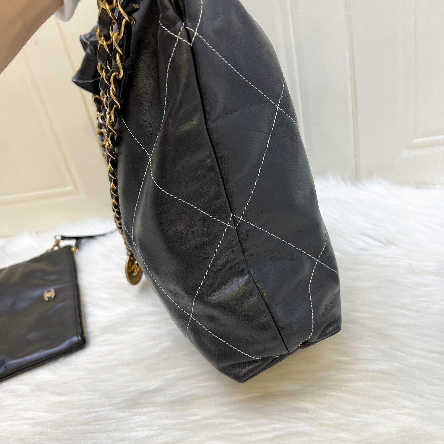 Chanel 22 Medium Hobo Handbag in Black Calfskin with White Stitch Quilting and AGHW (Model: AS3261)