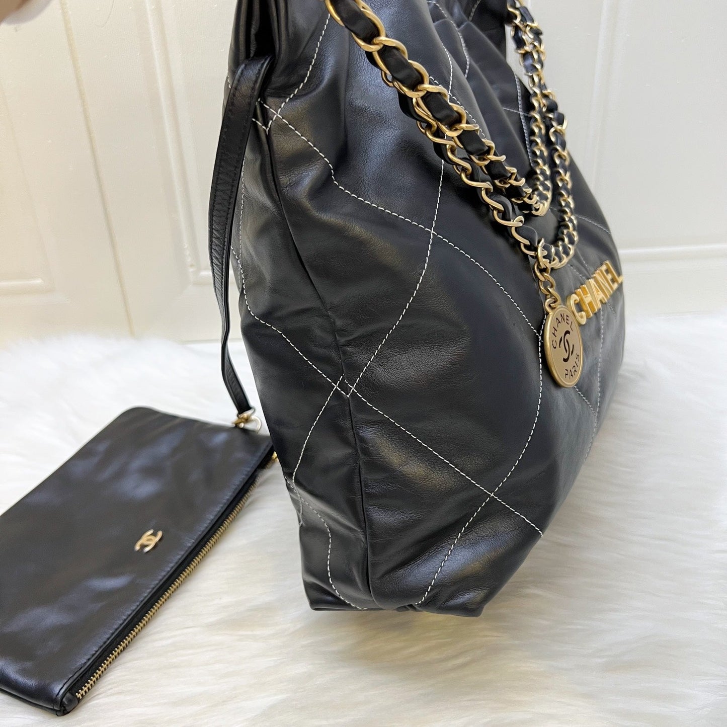Chanel 22 Medium Hobo Handbag in Black Calfskin with White Stitch Quilting and AGHW (Model: AS3261)