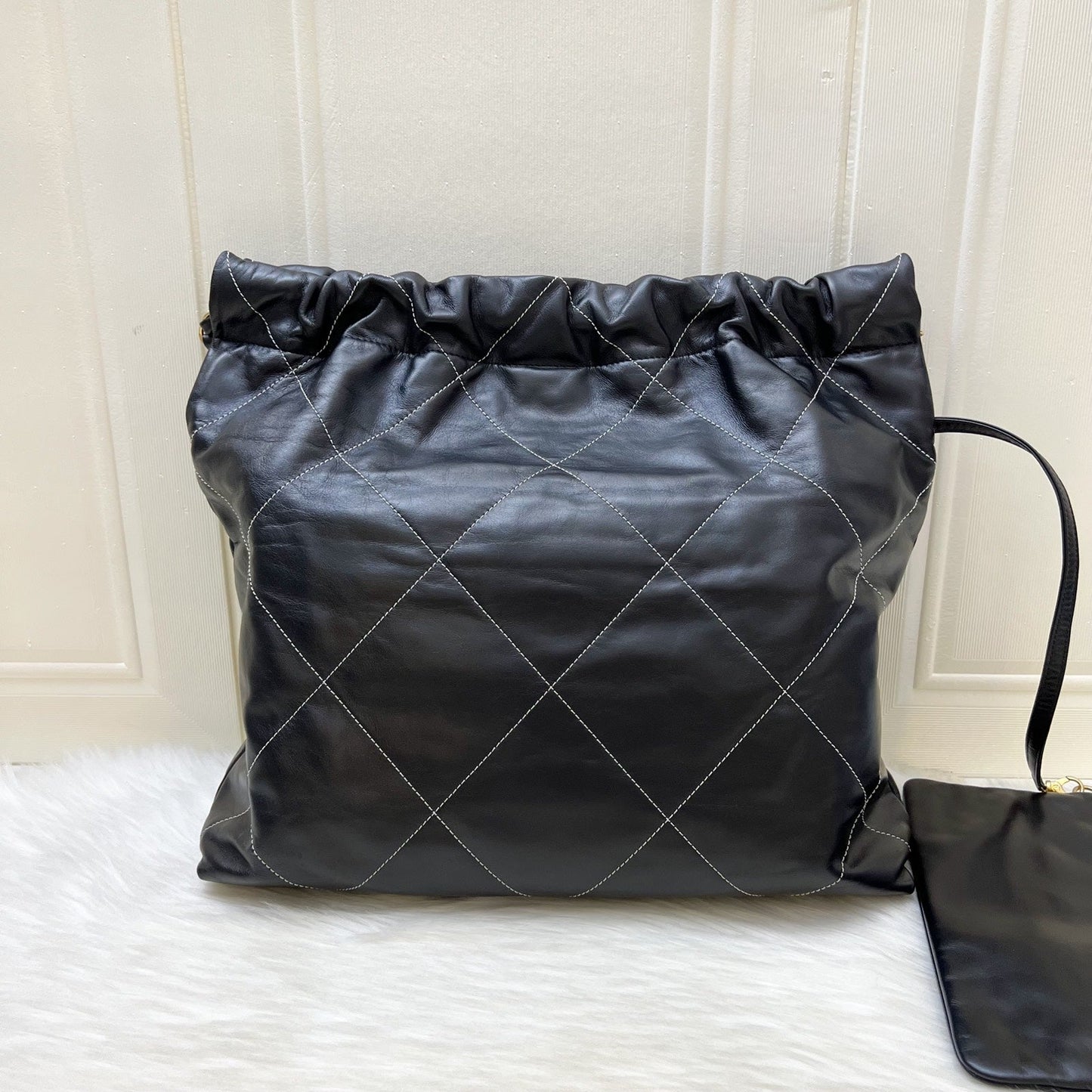 Chanel 22 Medium Hobo Handbag in Black Calfskin with White Stitch Quilting and AGHW (Model: AS3261)