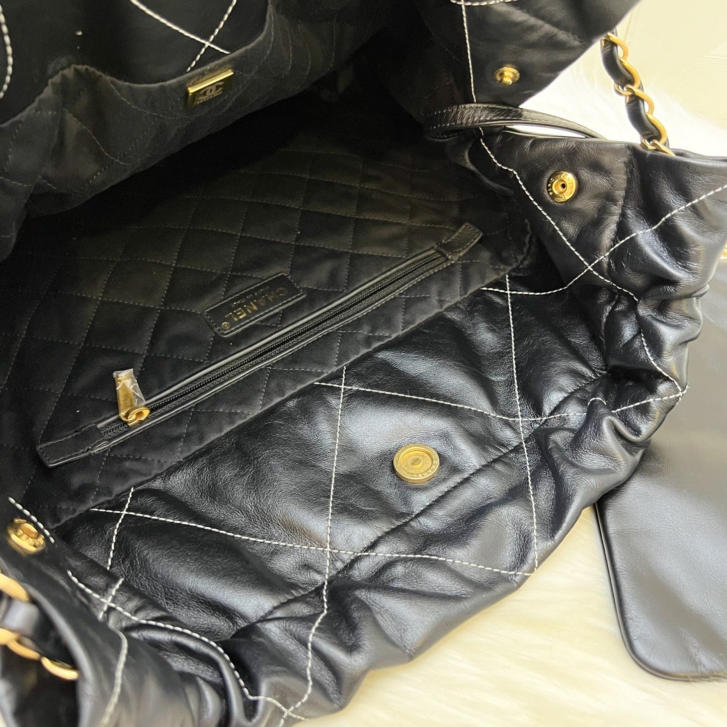 Chanel 22 Medium Hobo Handbag in Black Calfskin with White Stitch Quilting and AGHW (Model: AS3261)