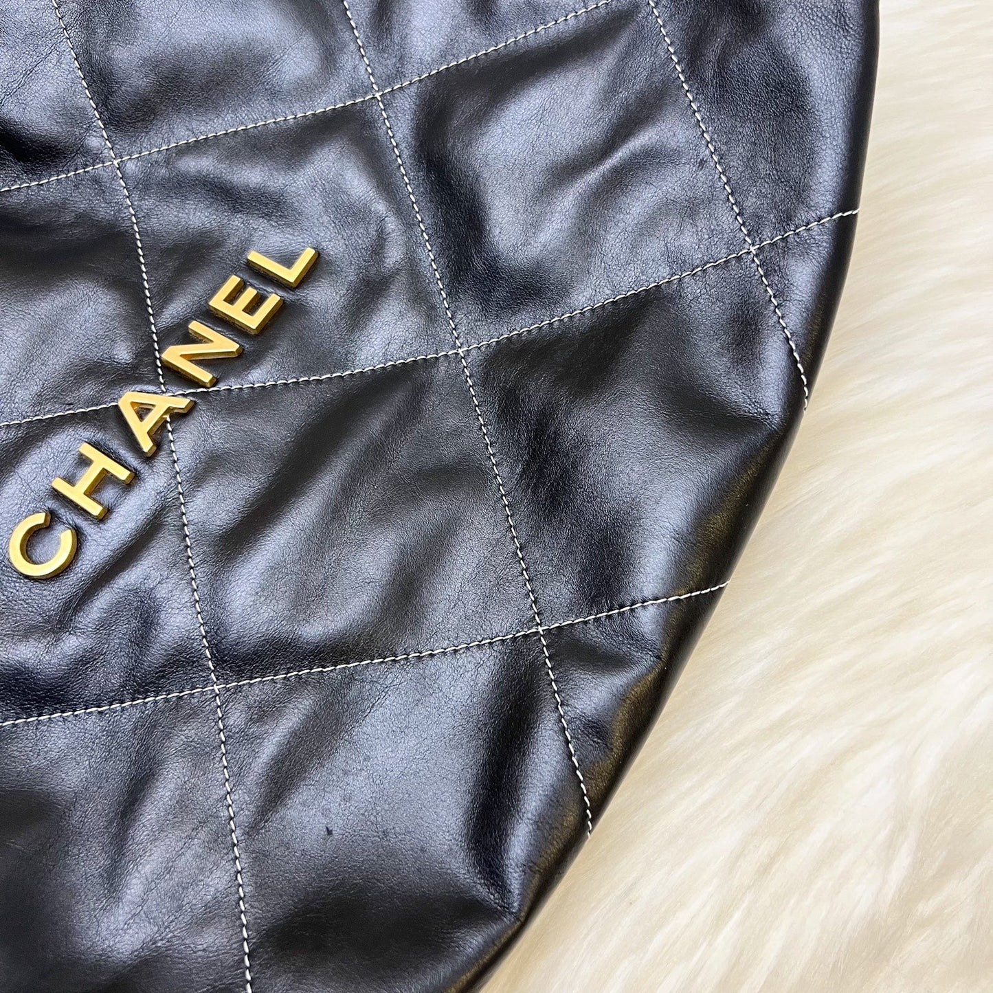 Chanel 22 Medium Hobo Handbag in Black Calfskin with White Stitch Quilting and AGHW (Model: AS3261)