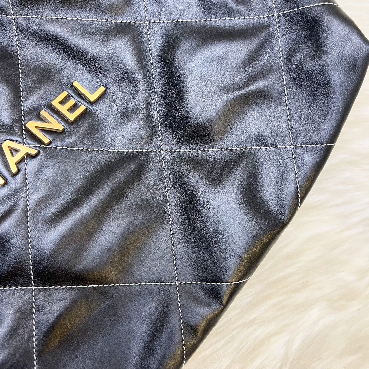 Chanel 22 Medium Hobo Handbag in Black Calfskin with White Stitch Quilting and AGHW (Model: AS3261)