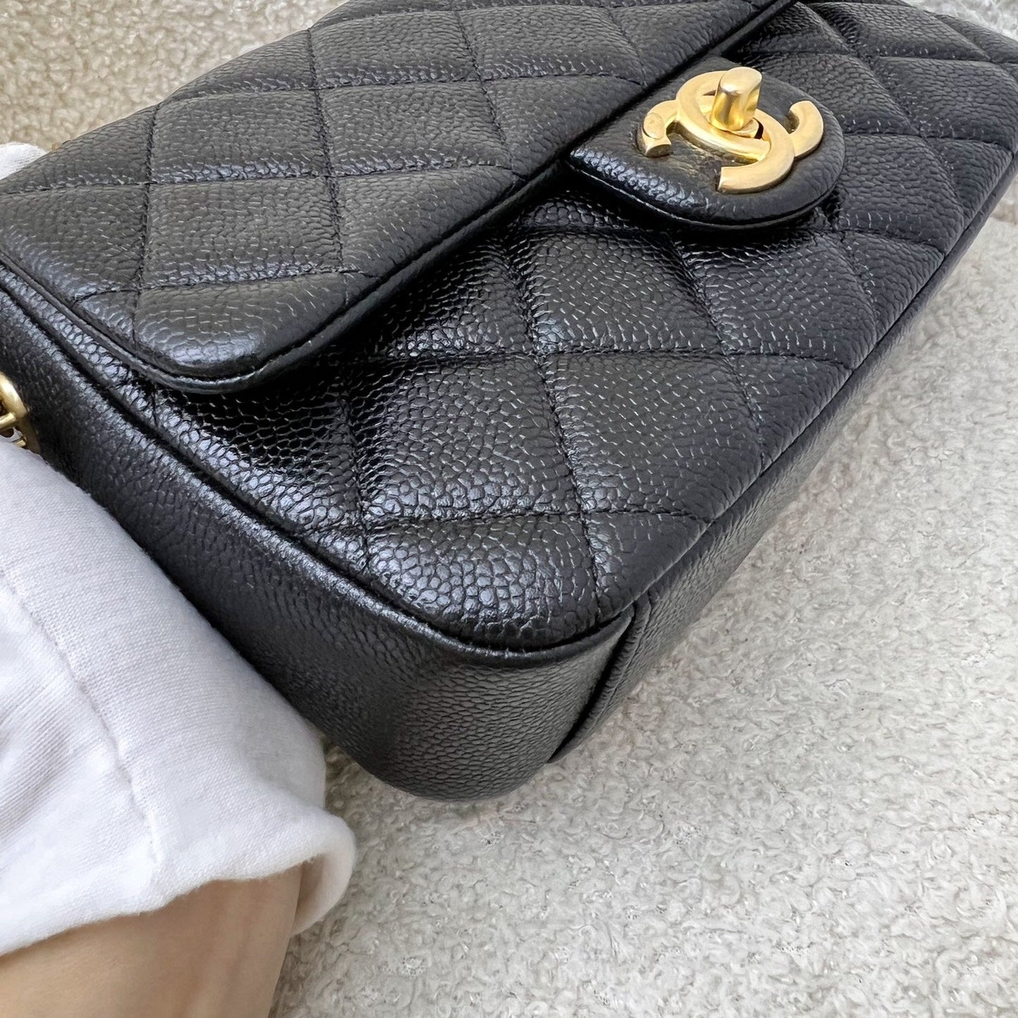 Chanel 21A Medallion Small Flap in Black Caviar and AGHW (Model: AS2528)