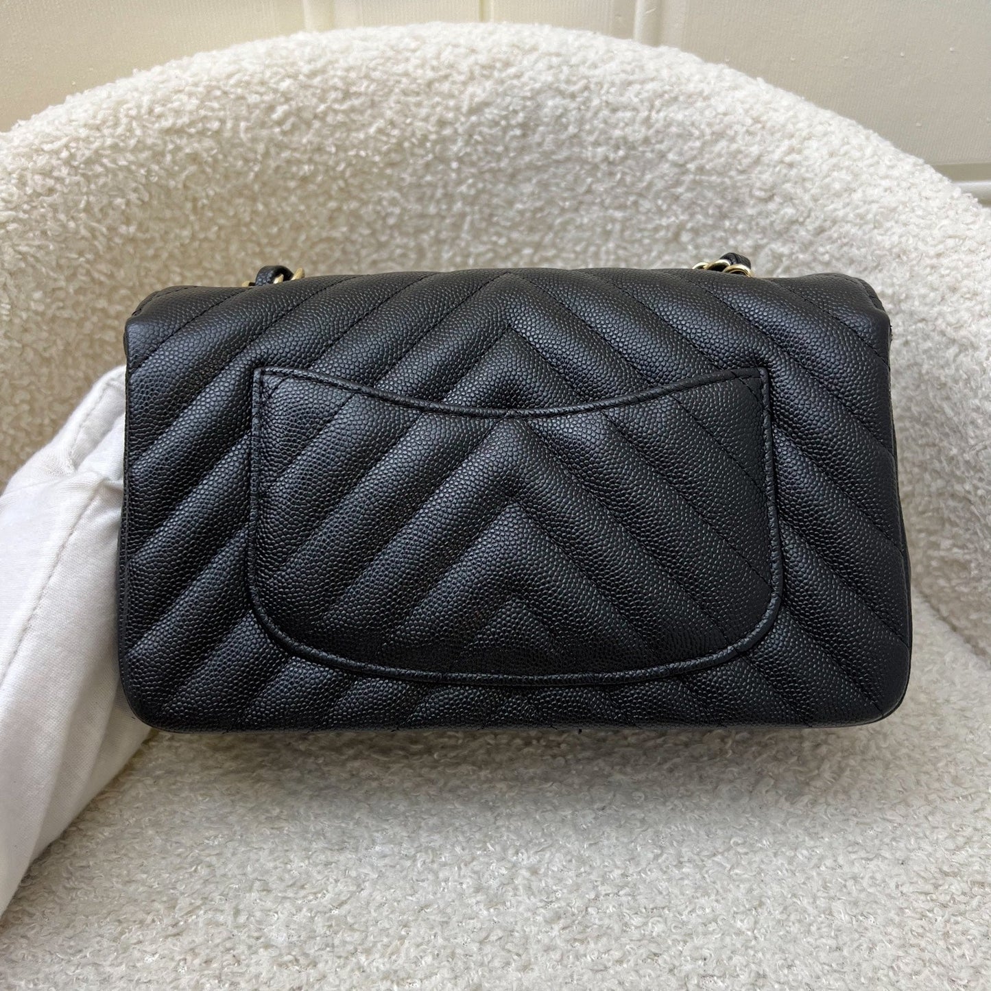 Chanel Classic Mini Rectangle Flap in Chevron Quilted Black Caviar and LGHW