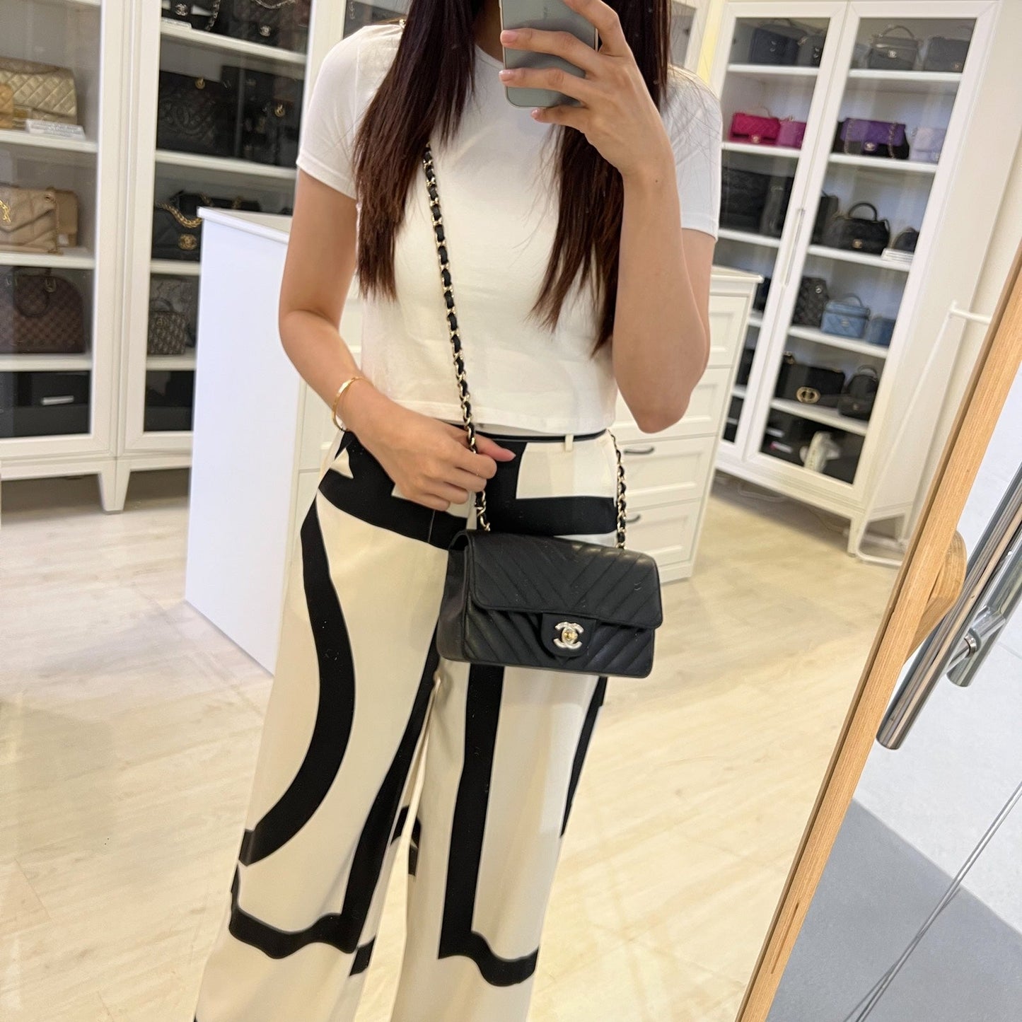 Chanel Classic Mini Rectangle Flap in Chevron Quilted Black Caviar and LGHW