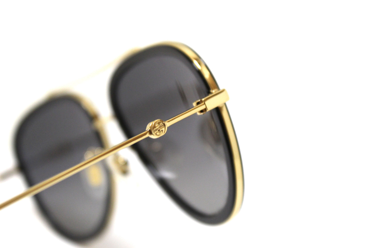 Gucci Black and Gold Sunglasses GG0062S