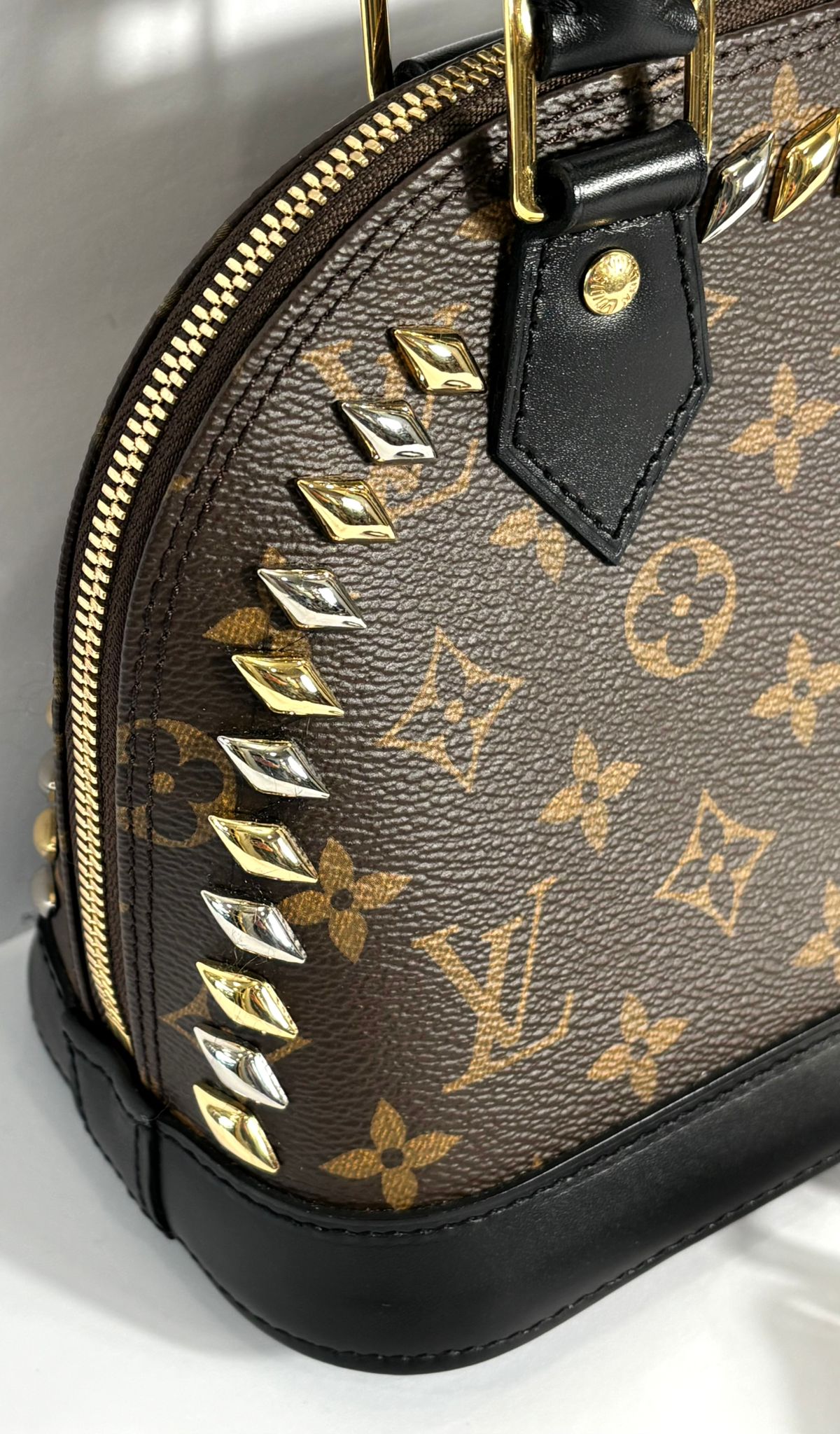 LOUIS VUITTON MONOGRAM MACASSAR STUDDED ALMA BB BAG