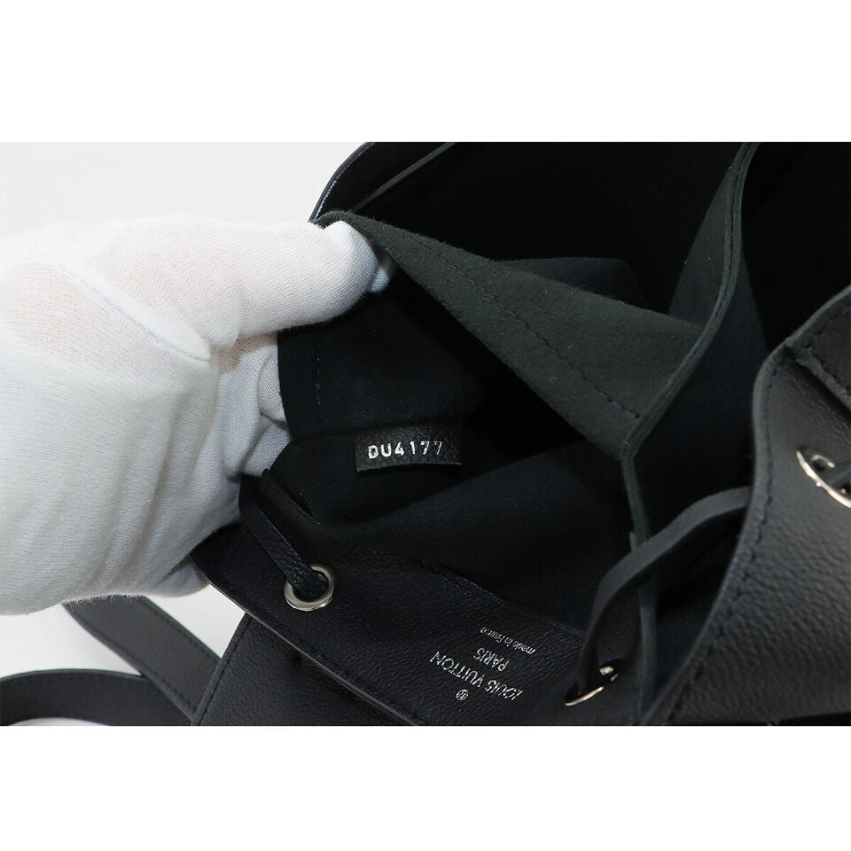 LOUIS VUITTON Lock Me  Leather Noir Black Backpack