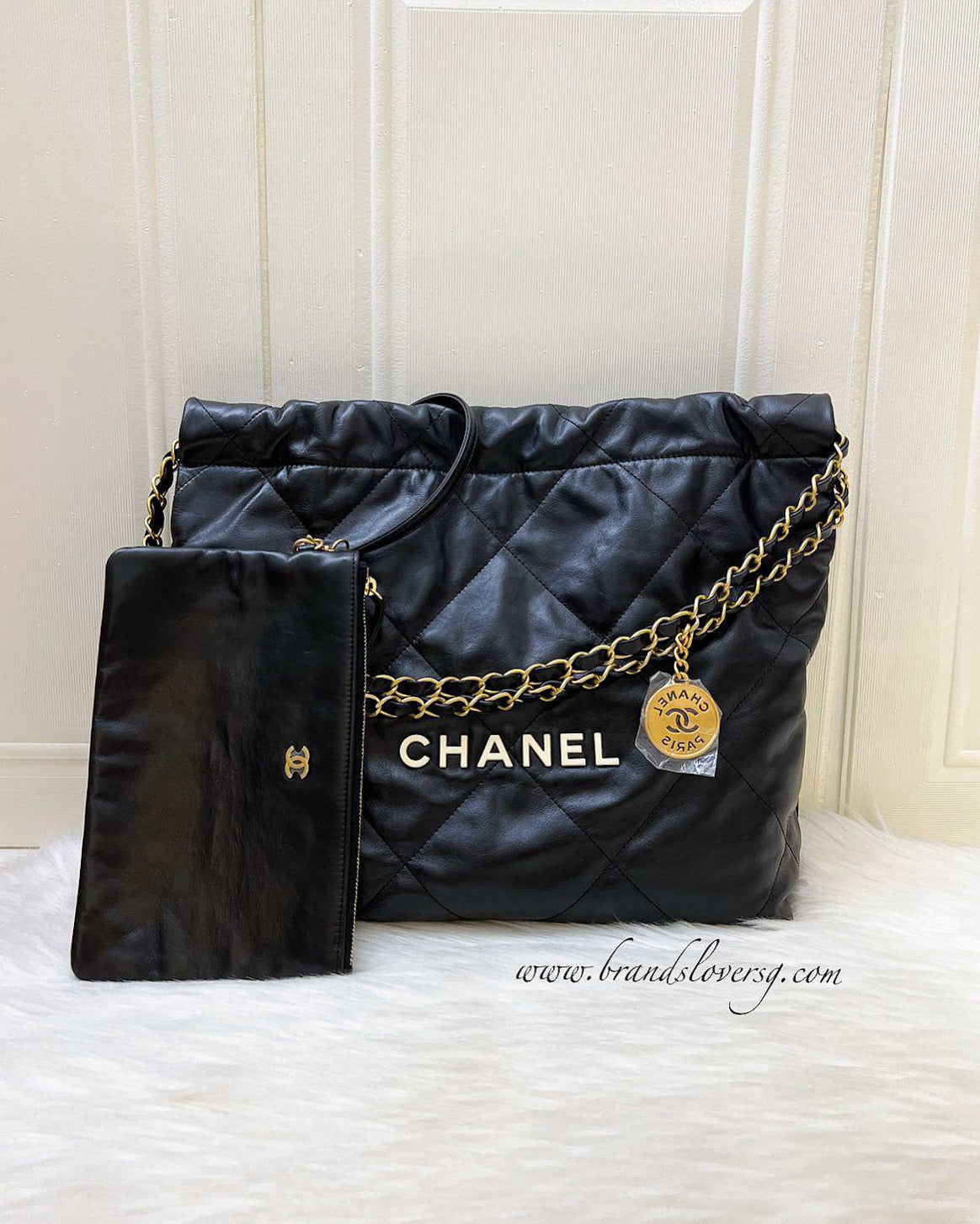 Chanel 22 Small Hobo Bag with White Logo in Black Calfskin and GHW