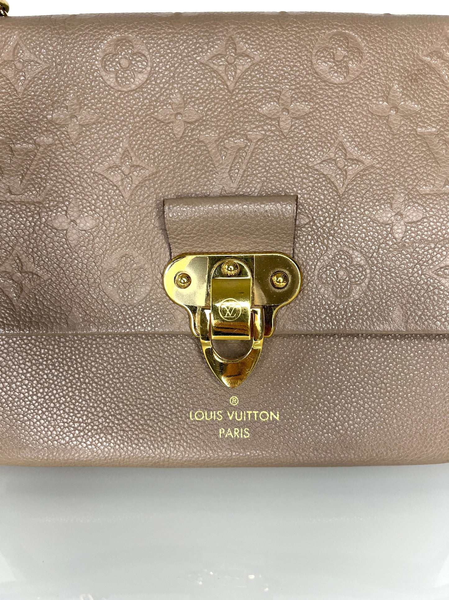 Louis Vuitton Pre-Loved Vavin PM beige Empreinte Leather Shoulder Bag