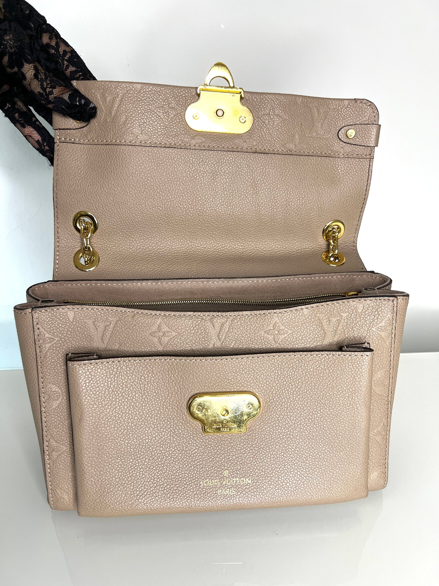 Louis Vuitton Pre-Loved Vavin PM beige Empreinte Leather Shoulder Bag