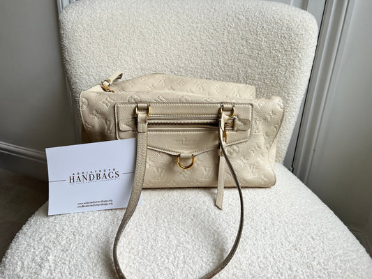 Louis Vuitton Inspiree in Cream Empreinte Leather with gold hardware