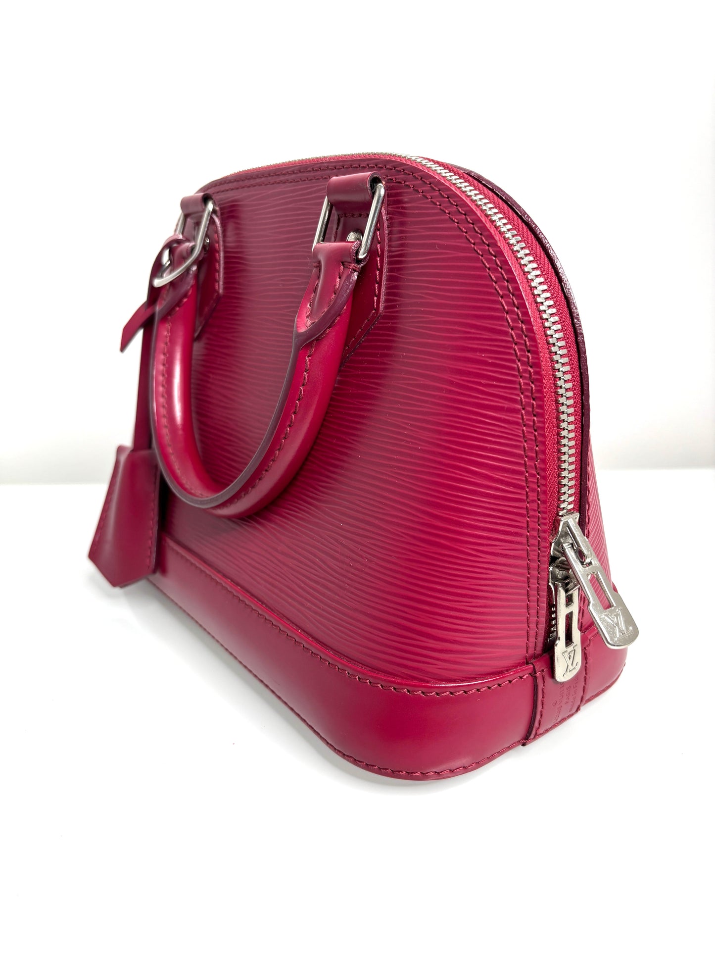 Louis Vuitton Alma BB Fushia Epi Leather Handbag - Preloved
