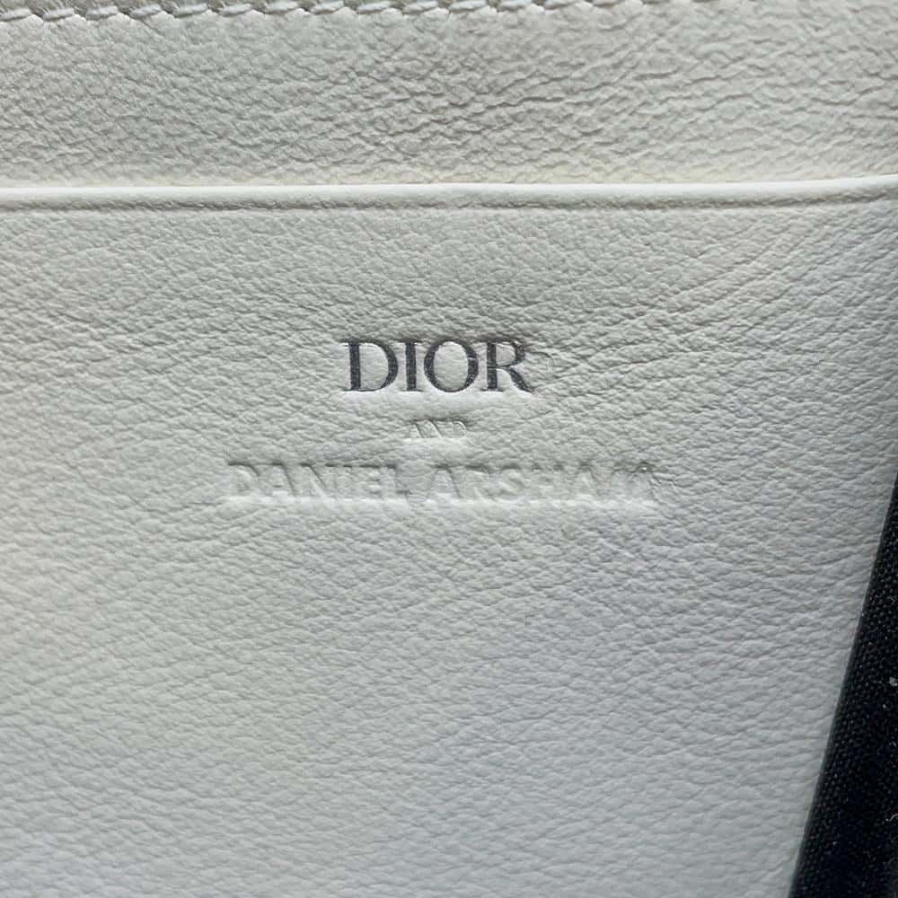 Dior Daniel Arsham Collaboration Newspaper Pochette Bag White Leather