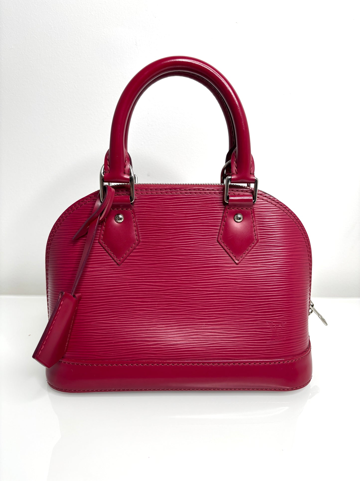 Louis Vuitton Alma BB Fushia Epi Leather Handbag - Preloved