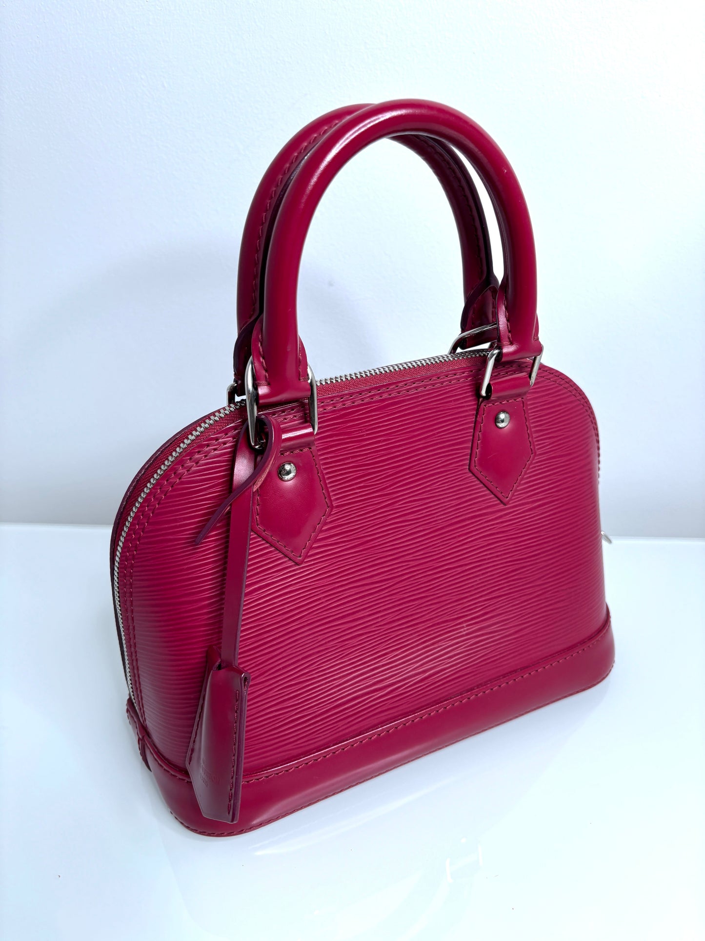 Louis Vuitton Alma BB Fushia Epi Leather Handbag - Preloved