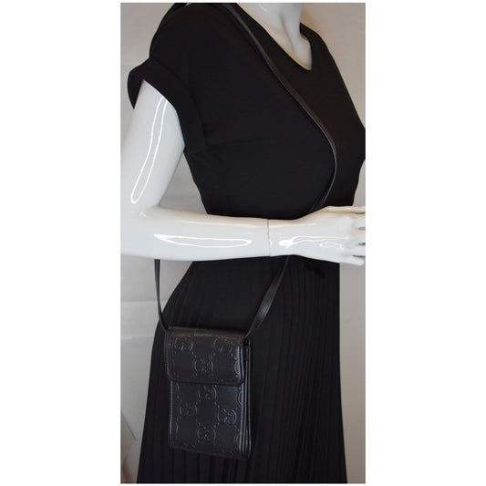 GUCCI GG Embossed Leather Mini Messenger Bag Black 625571