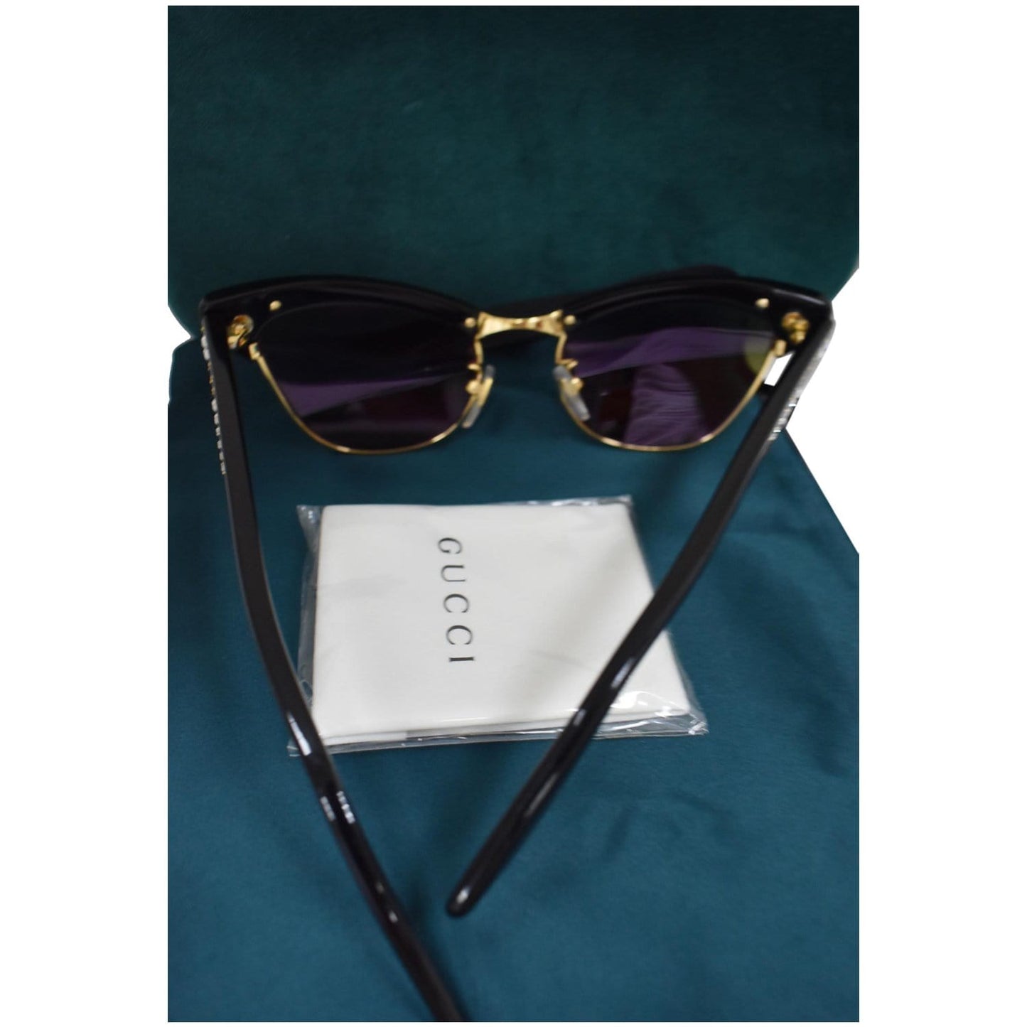 GUCCI GG0153S 001 Black Frame Cat Eye Sunglasses Pink Mirrored Lens